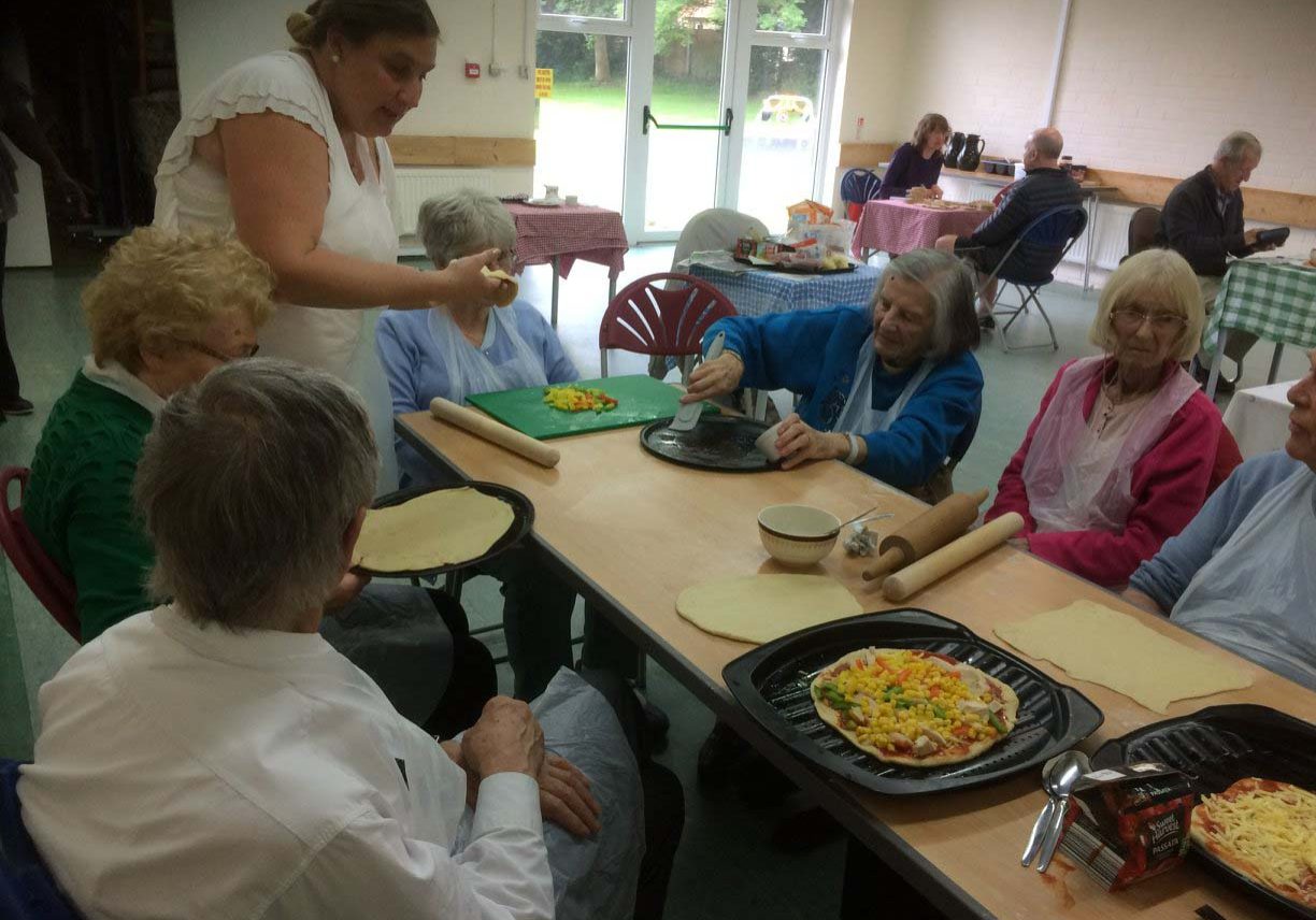Cooking pizza with residents